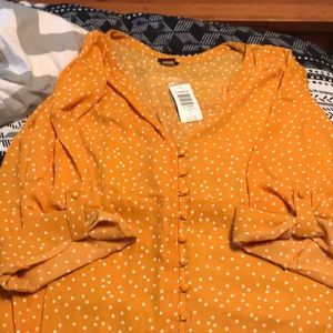 Marigold polka dot top